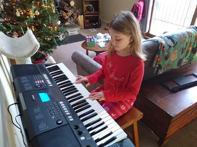 Grace at the piano